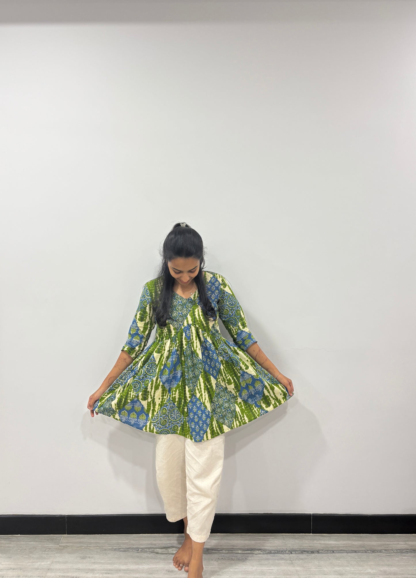Green and blue short top